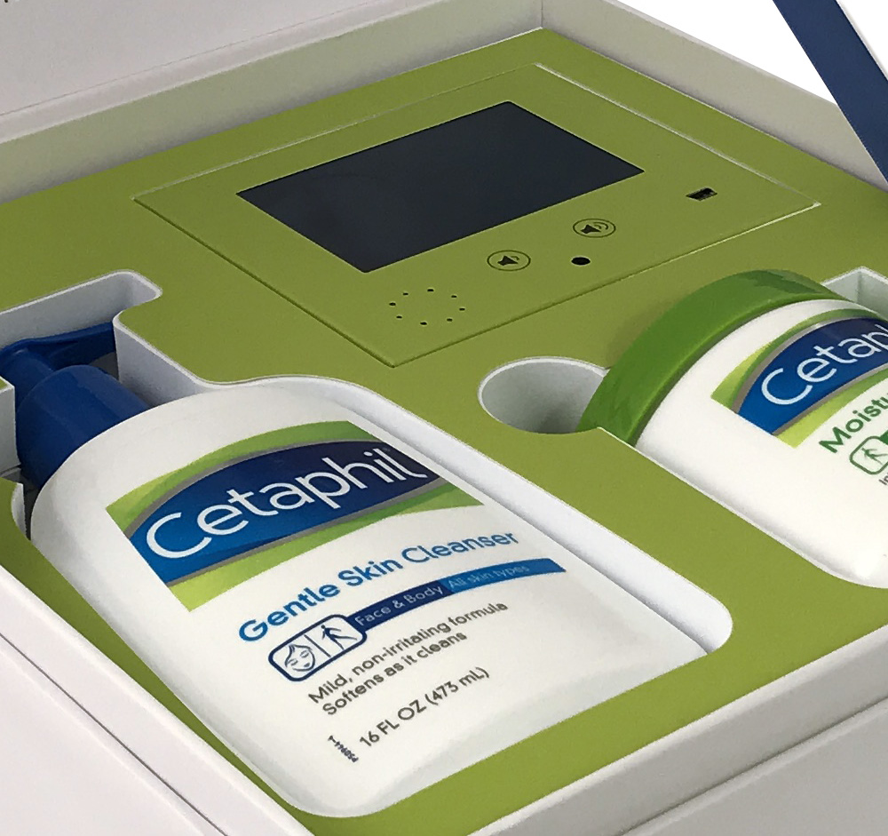 Detail of Cetaphil video box showing how the Cetaphil cream is nested inside the packaging.