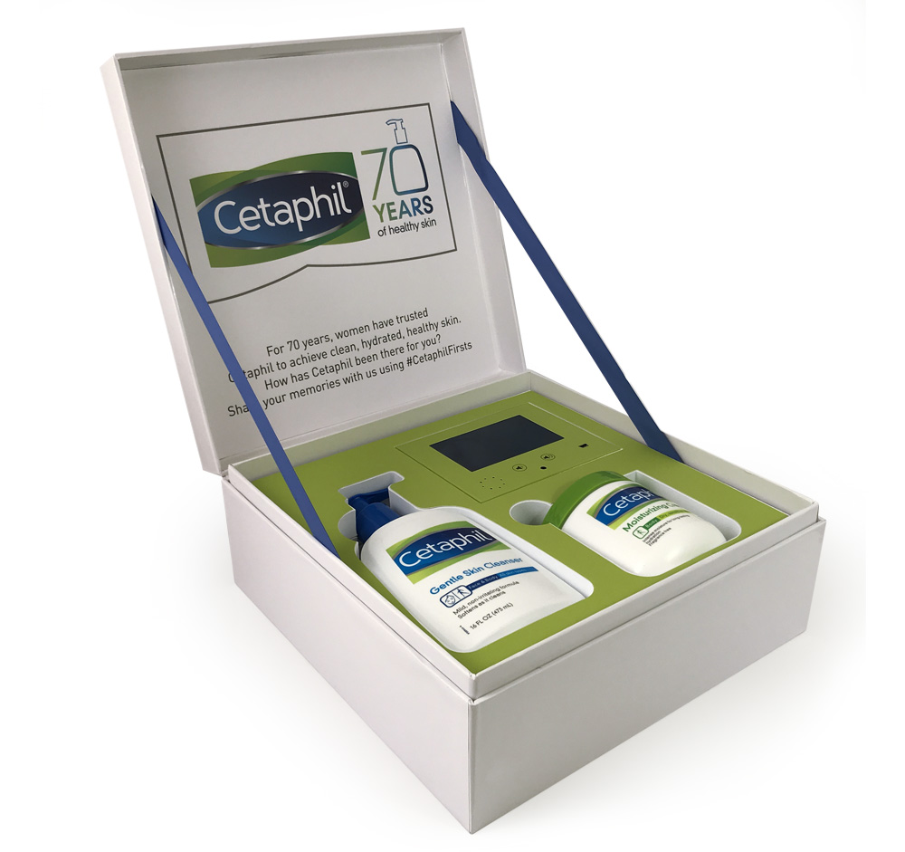Cetaphil video box shown open featuring matching blue ribbons